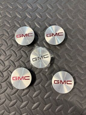 GMC wheel center caps 4 red & 1 black